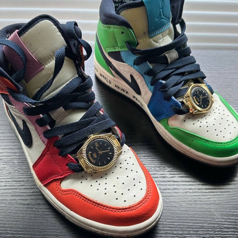 Multicolor High-Top Jordans with Gold Watch Accent